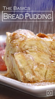 bread pudding sitting on top of a white plate