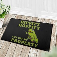 a door mat that says happy hoppity get off my property with a frog on it