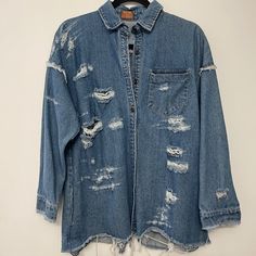 Brand New Distressed Denim Jacket Oversized Ripped Blue Outerwear, Distressed Light Wash Outerwear For Day Out, Light Wash Distressed Outerwear For Day Out, Oversized Distressed Medium Wash Denim Top, Oversized Distressed Denim Top, Oversized Distressed Denim Top In Medium Wash, Denim Blue Outerwear With Frayed Hem, Distressed Denim Jacket For Day Out, Denim Blue Outerwear With Frayed Hem For Day Out