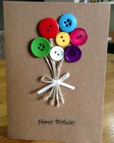 a birthday card with buttons on it