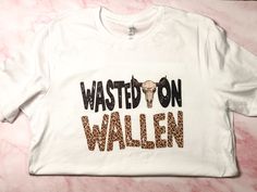 Grab our Wasted on Wallen Tee. Our shirts are Bella + Canvas. Our shirts are unisex. Please noted our shirts are made to order. Please allow 3 to 5 days. Wasted On Wallen, Country Tees, Fayetteville Nc, 100 Days Of School, Star Shirt, Bella Canvas, Gender Neutral, Adult Outfits, T-shirt