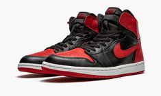 One of the most iconic and important sneakers of all time, the original black and red Air Jordan 1 was worn by Michael Jordan in 1985 and will be forever legendary.  Here we have the 2001 release, which features the shoe in its truest form with the Air Jordan 1’s original high-top cut and Nike Air branding on the tongue. Classic Custom University Red Sneakers For Streetwear, University Red Jordan Shoes For Streetwear, Classic University Red Custom Sneakers For Streetwear, Classic High-top Sneakers With Red Sole For Sports, Classic Red High-top Sneakers With Contrast Sole, Custom High-top Sneakers With Red Sole For Training, Red Sole High-top Sneakers For Training, Classic Black Sneakers With Red Sole, Red Air Jordan 1