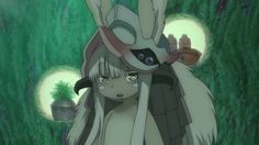 an anime character with long white hair and big ears, wearing a rabbit costume in the woods