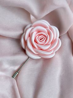 - Material: Our Camellia Flower Pin is meticulously crafted to elevate your style and timeless sophistication. Each flower lapel pin is entirely handmade from high-quality matte satin, ensuring elegance, unique craftsmanship, and durability. - Unisex & Versatility: Suitable for both men and women, it functions as both a boutonnière and a brooch, adding sophistication to any outfit for any occasion. - Must-Have Accessory: Perfect for weddings, parties, cocktail events, nights out, formal occasions, and even everyday work attire. Designed for both men and women, it showcases the camellia, a symbol of love and perfection, inviting you to elevate your style with grace. - Size, Secure & Stylish: It measures approximately 5cm (1.96") in diameter, ideal for adding an elegant touch to suits and at Formal Pink Lapel Pin, Elegant Flower Shaped Lapel Pin With Floral Decoration, Cheap Elegant Flower-shaped Pins, Elegant Flower Shaped Lapel Pin For Gift, Cheap Elegant Flower Shaped Lapel Pin, Elegant Pink Flower Pins, Mini Pastel, Suit Pin, Flower Lapel