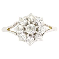 an old mine cut diamond cluster ring in 18ct yellow gold and white gold,