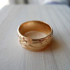 This band ring is handcrafted from 14k gold filled. It is a nice wide 8mm band. The pattern depth is shallow compared to some of my other designs. It adds a subtle interest without being over the top. If you want a more dramatic design I recommend my other heavy pattern ring that has a deep contrast to the pattern:https://www.etsy.com/listing/69736326/14k-gold-filled-heavy-pattern-band-ringThis ring makes a great wedding band. Couple with my 4mm pattern ring to make a wedding band set. http://ww Wedding Band Couple, Band Couple, Simple Gift Wrapping, Pattern Ring, Wedding Band Sets, Simple Gifts, Love Ring, Topaz Ring, Gold Bands