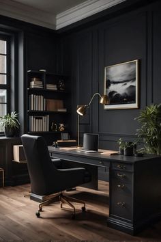 an office with black walls, wooden floors and a desk in front of a window