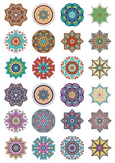 an image of many different colored designs on white paper, including circles and stars in the center