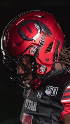 a close up of a football player wearing a helmet