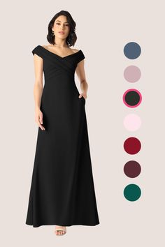 a woman in a long black dress with different colors