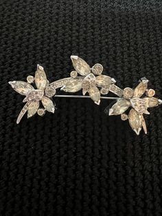 "Authentic Eisenberg Brooch /Pin, Clear Rhinestones, In A Large Ark Featuring Flowers, And Setting In Rhodium Plated. The Rhinestone Are Prong Set And Paste. Signed Eisenberg, Same Handwriting Scrip As Eisenberg Original, But Without The Second World.The Rhinestone Are Bright And Sparked . Excellent Vintage Condition For Is Age Without Missing Stone,Please Look At All The Pictures So You Know What Your Getting. Are From Mid 40's To The 50's, Fallon And Kappel Manufacture All Eisenberg Jewelry Fr Formal Crystal Brooches With Sparkling Stones, Formal Costume Jewelry Brooches With Sparkling Stones, Wedding Costume Jewelry Brooches With Sparkling Stones, Crystal Brooches With Sparkling Stones For Anniversary, Anniversary Crystal Brooches With Sparkling Stones, Cute Box, Second World, Clear Rhinestones, Handwriting