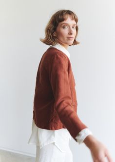 "The garment comes in a heavy-weight (340 g/m2) linen, which is suitable for all-season clothing. Francis is a short heavyweight jacket with a metal snap button closure and delicate front pockets. SIZING & FIT This garment is true to size, and we recommend choosing the size you usually wear. If you want the garment to be loose-fitting, choose a larger size than you usually wear. Model is 5,10\" (179cm) tall with a 86cm/33.8″ bust, 64cm/25,1\" waist, 93cm/36,6\" hip, and she is wearing an XS Linen Cardigan For Layering In Fall, Fall Linen Cardigan For Layering, Winter Workwear Linen Cardigan, Linen Cardigan For Workwear In Fall, Fall Workwear Linen Cardigan, Brown Linen Outerwear With Relaxed Fit, Brown Relaxed Fit Linen Outerwear, Fall Linen Cardigan With Relaxed Fit, Brown Linen Blazer For Fall