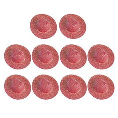 six pink buttons with glitter on them are arranged in the shape of a circle,