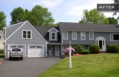 a gray house with two cars parked in the driveway