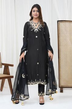 Black kurta in pure spun silk base with hand embroidery. It is paired with matching pants and pure organza dupatta. - Aza Fashions Elegant Embroidered Silk Churidar, Elegant Embroidered Cotton Silk Churidar, Elegant Slub Silk Lawn Suit With Chikankari Embroidery, Elegant Tussar Silk Unstitched Suit For Navratri, Fitted Silk Lawn Suit For Navratri, Black Raw Silk Salwar Kameez, Elegant Slub Silk Unstitched Suit With Intricate Embroidery, Elegant Unstitched Slub Silk Suit With Intricate Embroidery, Elegant Unstitched Slub Silk Lawn Suit