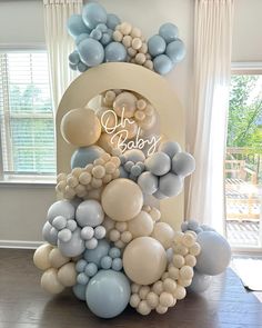 balloons are arranged in the shape of a tower