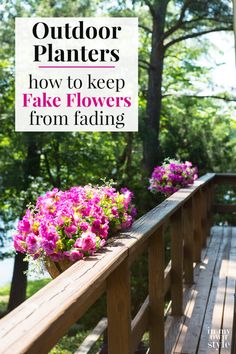 some flowers are sitting on a wooden railing with the words, outdoor planters how to keep fake flowers from fading