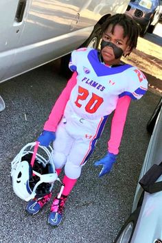 Check out this little athlete rocking the coolest gear with pink spats and a helmet ready to dominate! 🏈💖 Discover youth sports fashion that's both stylish and ready for action. #CoolKids #SportsStyle #PinkSpats #YouthAthletes #GameDayReady Cool Kid, Cool Gear