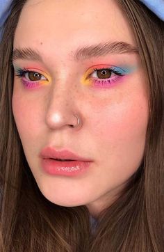 it’s time for short-shorts, swimsuits, and hot summer days—also known as the most perfect time of the year—which means it’s also time to try... Rainbow Eye Makeup, Funky Makeup, Mekap Mata, Bright Eye Makeup, Pride Makeup, Summer Makeup Looks