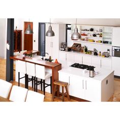 the kitchen is clean and ready to be used as a dining room or living room