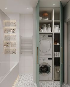 a washer and dryer in a small room