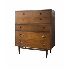 a wooden dresser with four drawers and two pulls on the bottom drawer, against a white background