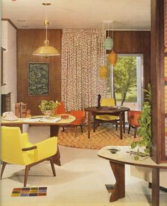 a living room filled with lots of furniture next to a fire place and window covered in curtains