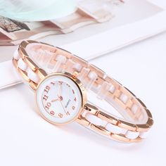 Product information: Movement type: quartz Thickness: 7mm Dial diameter: 25mm Crown type: screw crown Mirror material: ordinary glass mirror Clasp style: concealed buckle Buckle material: stainless steel Strap material: alloy Dial shape: round Case material: alloy Color: gold, silver Packing list: Watch*1 Product Image: Trendy Round Metal Watch, Trendy Metal Round Watches, White Metal Watch As Gift, White Metal Watch For Gift, White Metal Watches With Metal Dial, White Metal Watch With Metal Dial, Elegant White Metal Watch, Elegant White Metal Watches, Rose Gold Fashion