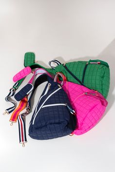 Perfect your on-the-go lifestyle with Shiraleah’s Ezra Sling Bag. This perfectly sized bag is worn across the body with its single adjustable, padded cross-body strap. Featuring a pop of contrasting color scheme and rope zipper-pull detail, this bag is an excellent addition to any wardrobe - especially those who appreciate the convenience of hands-free accessories. Pair with other items from Shiraleah's Ezra collection to complete your look! Features a single adjustable padded cross-body strap, Multicolor Nylon Crossbody Shoulder Bag, Sporty Backpack With Adjustable Strap Crossbody, Sporty Crossbody Backpack With Adjustable Strap, Sporty Multicolor Bag With Adjustable Strap, Sunglass Holder, Bag Green, Zipper Pulls, Green Bag, Sling Bag