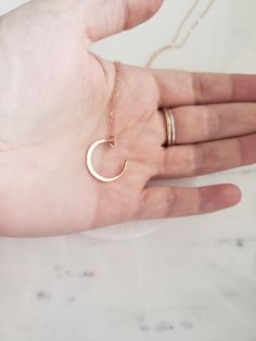 A subtle lightweight statement! Hand formed and hammered crescent moon adds a touch of an organic element to the piece. Choose from your choice of sterling silver, 14k gold fill, or 14k rose gold fill. Gold fill does not wear off or tarnish and contains 100 times more gold than plated jewelry! Finished with a lobster clasp. (All components are sterling or gold fill) no cheap finishing touches ;) Rose Gold Crescent Necklace With Moon Charm, Rose Gold Crescent Moon Charm Necklace, Minimalist Rose Gold Necklace With Moon Charm, Minimalist Rose Gold Jewelry With Moon Charm, Dainty Hammered Rose Gold Necklace, Minimalist Hand Forged Rose Gold Jewelry, Minimalist Rose Gold Copper Jewelry, Gold Crescent Moon Necklace, Witchy Necklace