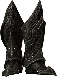 two black leather boots with metal decorations on them