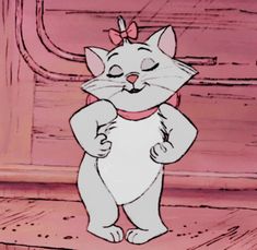 a cartoon cat standing in front of a wooden door and wearing a pink bow tie