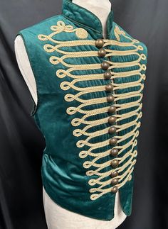 Military Waistcoat green Gothic Raven SDL Clothing Steampunk Military style Waistcoat This is a  dark green cotton velvet mix waistcoat. It is a military style cream braid detail  and rustic  buttons.  This  waistcoat is in two sizes  ML chest 40/42" XL chest 44/46" Thank you for looking Green Winter Vest With Buttons, Teal Clothes, Gothic Raven, Teal Outfits, Wicked Costumes, Gothic Steampunk, Steampunk Clothing, Military Style, Mens Costumes