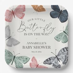 a baby shower plate with butterflies on it and the words, our little butterfly is on the way