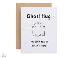 a white card with the words ghost hug on it and an image of a ghost