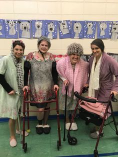 four women standing next to each other with crutches and walking canes on