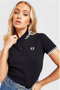 Black Polo T Shirt, Fred Perry Polo Shirts, Wreath Logo, Chest Machine, Twin Tips, Black Polo Shirt, Black Polo, Laurel Wreath, Polo T Shirts