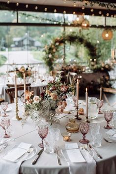 the table is set with many place settings