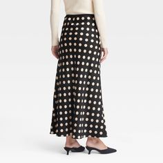 Dress up for brunches, lunches or dinners in chic style with this Maxi Slip Skirt from A New Day™. This maxi-length slip skirt is made from lightweight satin fabric for all-day comfort, while the full elastic waistband lends a secure fit. Tailored in a high-rise silhouette with a slim fit for a flattering look, you can pair this skirt with your fave tops and footwear for versatile ensembles. A New Day™: Style that goes wherever you do. Elegant Polka Dot Skirt For Spring, Spring Chic Polka Dot Skirt, Chic Polka Dot Skirt For Spring, Chic Fitted Polka Dot Skirt, Chic Polka Dot Relaxed Skirt, Chic Polka Dot Skirt Relaxed Fit, Chic Polka Dot Relaxed Fit Skirt, Chic Long Skirt With Polka Dot, Fitted Long Skirt In Polka Dot