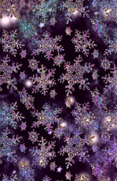 snow flakes are scattered on a dark background with stars and sparkles in the air