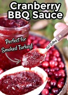 cranberry bbq sauce is being spooned into a jar with the words, perfect for smoked turkey