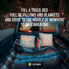 an image of a truck bed with pillows and blankets in the bed area on facebook