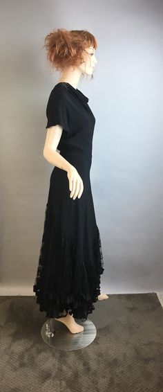 Gay Gibson Vintage 40s long formal bias cut dress, beautifully draped in great vintage condition size small or small/medium lace flare on bottom Shoulders 15 Chest 34 Waist 26 Hip 34 Nape to hem 57 Inches Fitted Floor-length Vintage Dress For Vintage Events, Vintage Fitted Evening Dress With Ruffles, Elegant Fitted Vintage Tea Length Dress, Classic Evening Dress With Lace Trim, Fitted Vintage Dress With Ruffles For Formal Occasions, Formal Fitted Vintage Dress With Ruffles, Vintage Fitted Evening Dress For Formal Events, Fitted Floor-length Dress For Vintage Events, Elegant Vintage Short Sleeve Dress For Formal Occasions