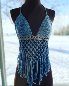 Beautifully handmade crochet bikini top. These look amazing paired with your favorite flannel or just with your favorite shorts and sandals! One size fits most.  The back and top tie so they are very adjustable. The cup size is universal depending on how much coverage you want. This style is very flattering on many different body styles. Colors are light blue and gray. Can also be made in colors of your choice. Message the shop to create your own colors! Handmade Triangle Halter Top For Beachwear, Handmade Triangle Halter Top For Beach, Handmade Triangle Halter Top For Beach Season, Adjustable Bohemian Halter Top For Festivals, Handmade Triangle Top Crop For Beachwear, Adjustable Crochet Top For Festival, Handmade Triangle Halter Top For Summer, Handmade Blue Swimwear For Festival, Handmade Halter Top For Festival Beachwear