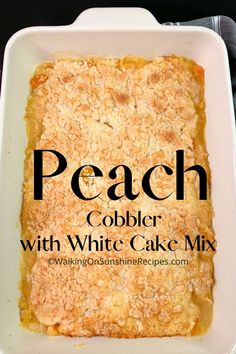 a casserole dish with white cake mix in it and the words, peach cobbler with white cake mix