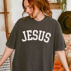 Jesus Comfort Colors Shirt Varsity Christian Shirt Jesus Tee Christian Gift for College Christian Tshirt Simple Christian Shirt for Church - Etsy Gray Graphic Tee With Letter Print, Basic Gray Shirt With Letter Print, Cotton Graphic Tee With Lettering, Graphic Tee With Lettering And Short Sleeves, Short Sleeve Graphic Tee With Lettering, Crew Neck Shirt With Lettering In Relaxed Fit, Relaxed Fit Crew Neck Shirt With Lettering, Crew Neck Graphic Tee With Lettering, Relaxed Fit Short Sleeve Shirt With Lettering