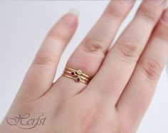 This listing is for ONE 14k or 18k solid golden stacking ring with a birthstone! A beautiful gift! Wire width: 1 mm. Gemstone: 2,5 mm. Material: 14K solid yellow -, white-, or rosegold I only use REAL gemstones, or synthetic gemstones as noted. If you like to have a real gemstone, instead of a synthetic gemstone, it's no problem at all. Please contact me. January - Garnet February - Amethyst March - Aquamarine April - Cubic Zirconia May - Emerald (synthetic) June - Moonstone (real) / Alexandrite Sapphire Birthstone, Amethyst Gem, Purple Band, Cute Rings, Lovely Jewellery, Dainty Ring, Stacking Ring, Birthstone Ring, Solid Yellow