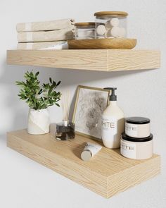 two shelves with various items on them and one shelf holding candles, soaps and other things