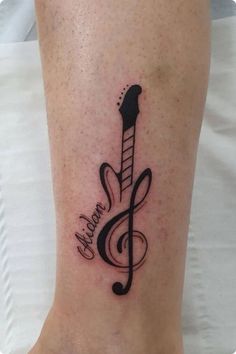 a musical note tattoo on the ankle