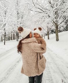 two girls walking in the snow together